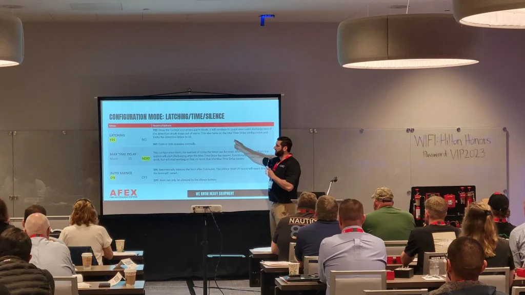 An AFEX engineer teaching a classroom full of technicians and distributors
