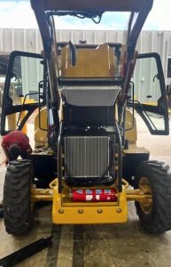 Compact Fire Suppression System Installed On a CAT Machine