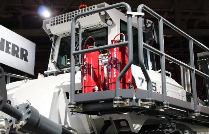 An AFEX fire suppression system installed on a Liebherr dozer
