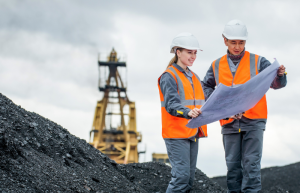 coal mine workers in an open pit
