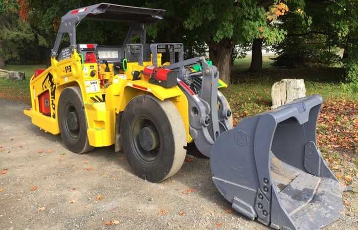 Skid Steer with bucket attachment