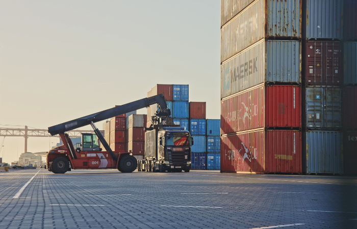 Port heavy equipment working around cargo
